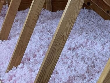 Pink fibreglass in attic